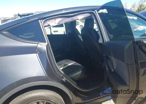 2025 Tesla Model Y Long Range Dual Motor Rear-Wheel Drive from USA, damaged, VIN 7SAYGDED9SF215904